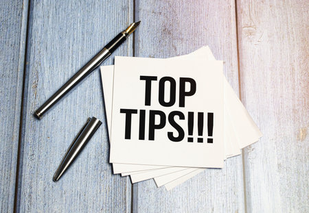 white sticker with the inscription - Top tipsの写真素材