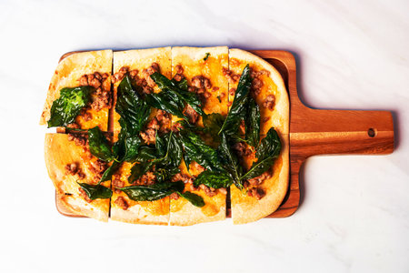 tart flambe minced pork with basil pizza on wood board