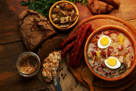 Traditional Zurek with sausage and egg, white borscht, polish homemade Easter soupの写真素材