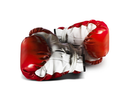 Red fighting gloves isolated on white background