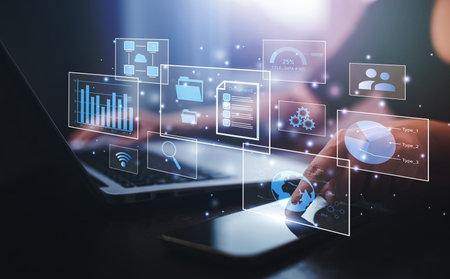 Businessman working on laptop and touch screen Online documentation database, IT consultant being...