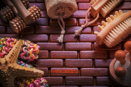Composition of bath accessories on checked wooden table mat sauna concept.の写真素材