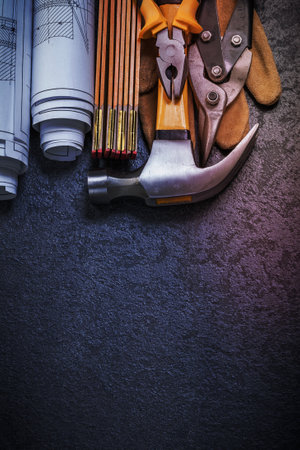 Blueprints wooden meter steel cutter pliers protective glove claw hammer.の写真素材