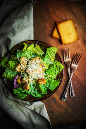 Caesar salad on rustic backgroundの写真素材