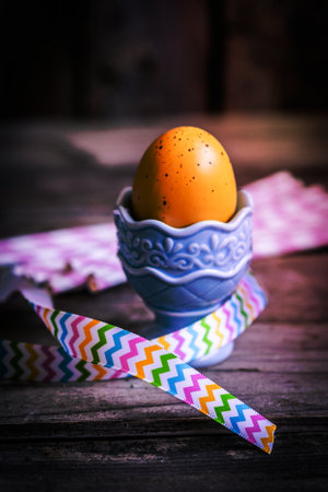 Easter Egg on wooden background