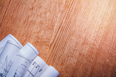 copyspace  image white blueprints on old brown wooden board horizontal version