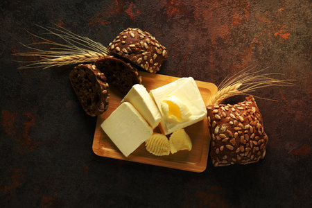 Concept of breakfast, eat food with butter, top view