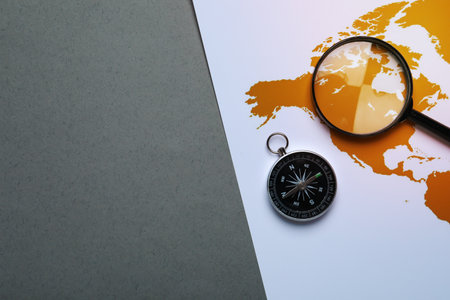 Traveling, adventure and vacation concept with compass
