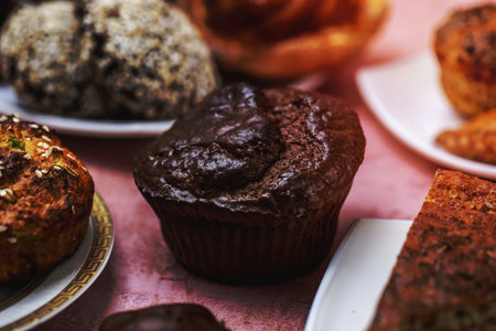 cupcakes dark chocolate sugar butter sour cream condenced milk side view jpgの写真素材