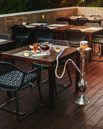 served tea table with orange shisha
