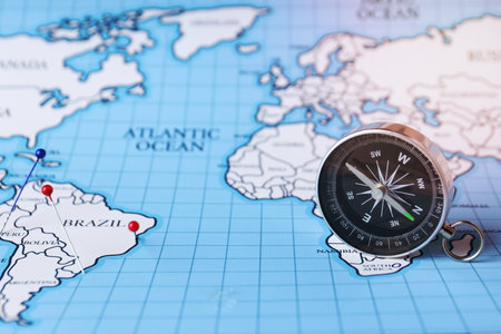 Traveling, adventure and vacation concept with compassの写真素材