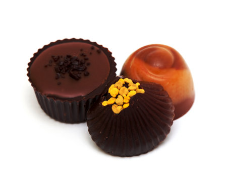 chocolate candies over white backgroundの写真素材