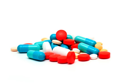 colorful pills  isolated on whiteの写真素材