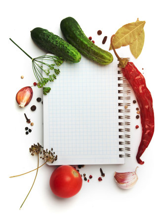 Notebook with recipes and shopping list in the kitchenの写真素材