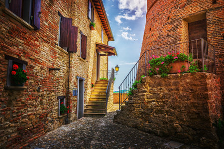 ITALY - JUNE 23, 2014: Typical Italian street in a small provincial town of Tuscan, Italy, Europeの写真素材