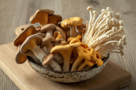 a bowl of mushrooms on a cutting boardの写真素材