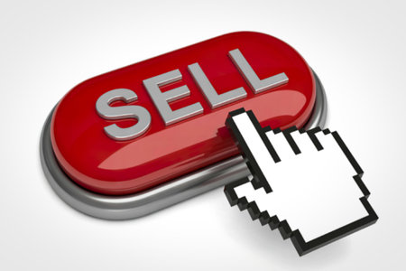 a large Sell button with a hand cursor hovering over itの写真素材