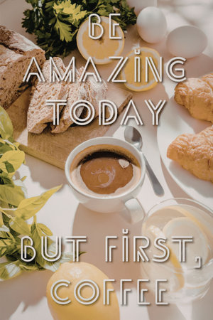 A breakfast spread with a cup of coffee, croissants, bread, eggs, and lemons on a table with a motivational quote.の写真素材