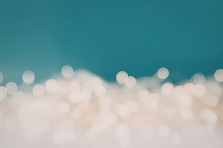 Blurry lights against a blue background creating a bokeh effect