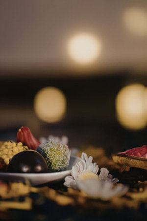 A peaceful arrangement of objects and flowersの写真素材