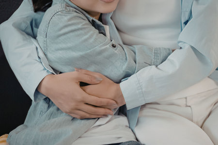 A person hugging a childの写真素材