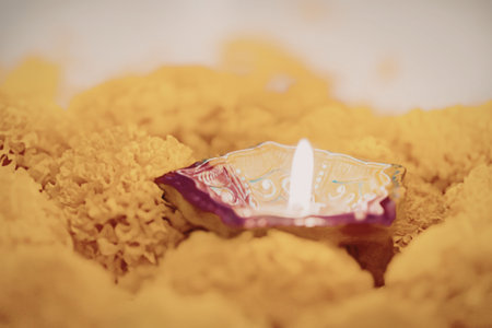 A small diwali lamp on marigoldの写真素材