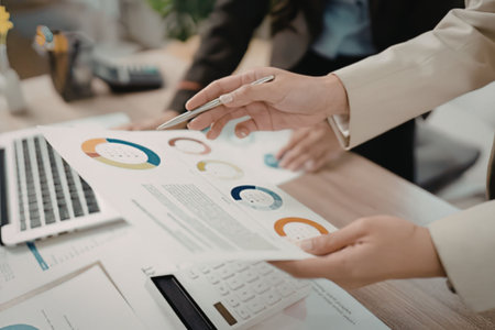 Business people analyzing data reports