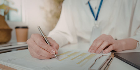 Business person analyzing data graph