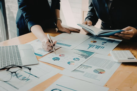 Business team analyzing financial dataの写真素材