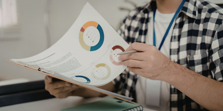 Businessman analyzing data charts