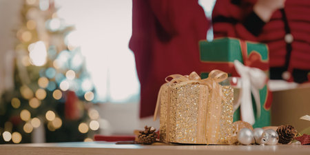 Christmas gift giving scene with tree