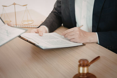 Lawyer reviewing documents at desk