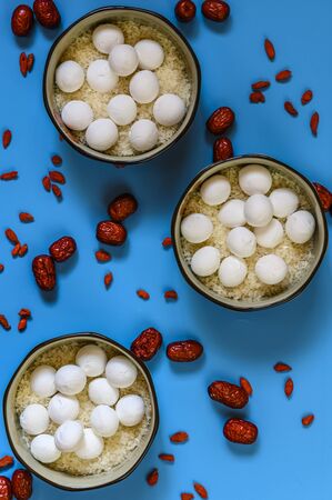 Tangyuan, Red dates and Wolfberry on a blue backgroundの写真素材