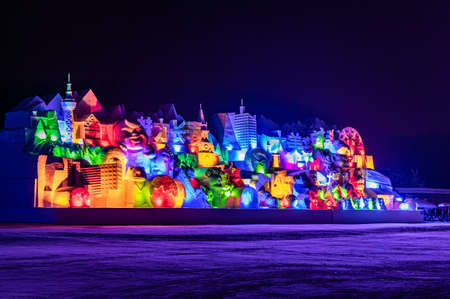 Night view of Snow World and light show along the way in Jingyuetan National Forest Park, Changchun, Chinaのeditorial素材