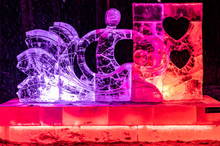 Night view of Snow World and light show along the way in Jingyuetan National Forest Park, Changchun, Chinaのeditorial素材