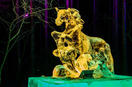 Night view of Snow World and light show along the way in Jingyuetan National Forest Park, Changchun, Chinaのeditorial素材