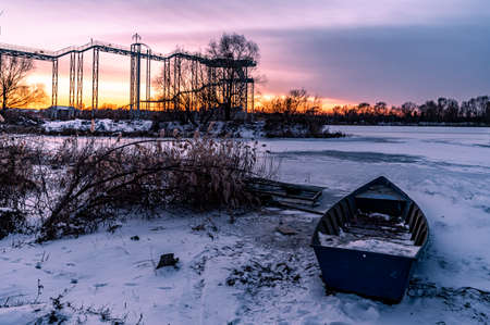 Winter scenery of the North Lake National Wetland Park in Changchun, China under the sunsetの写真素材