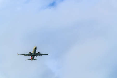 airliner flying in the skyの写真素材