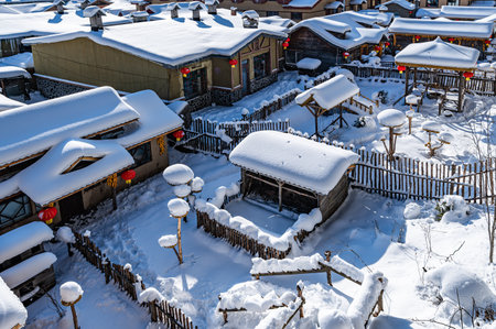 Landscape of houses and courtyards after snow in China's snow townの写真素材