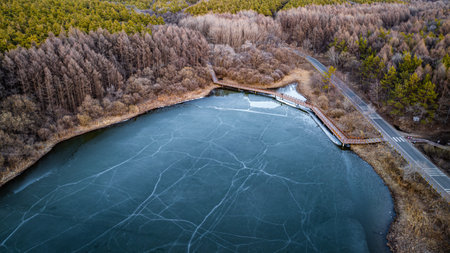 The landscape of Jingyuetan National Forest Park in Changchun, China, where ice melts and snow melts...