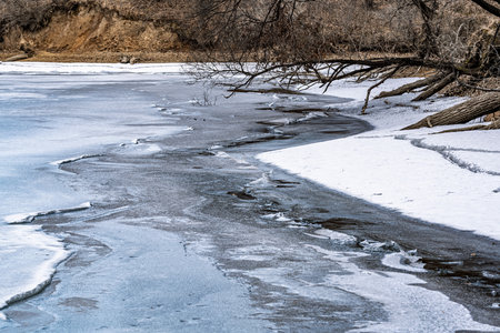 Melting lake in China Changchun Jingyuetan National Forest Parkの写真素材