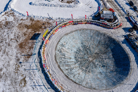January 23, 2026, Changchun, China: A giant ice pool for cars attracts tourists to compete in...
