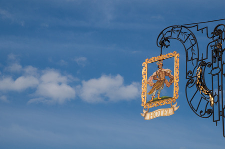 Hotel sign with blue skies in the backgroundの写真素材