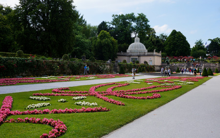 Salzburg, Austria - 21.06.2014: People strolling through the Mirabell gardensのeditorial素材