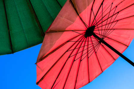 Colorful umbrellas in the sunの写真素材