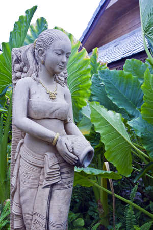molded woman Thai figure is thatting decrease tree water , ( , the molded figure in public nobody park is owner of ) , の写真素材