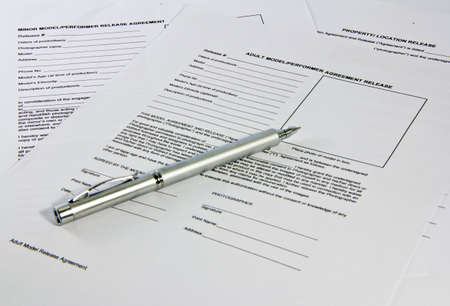 Pen saving on legal documents, contracts shot with the depth of informationの写真素材