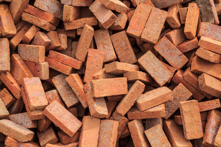 A pile of bricks orange Used in building construction