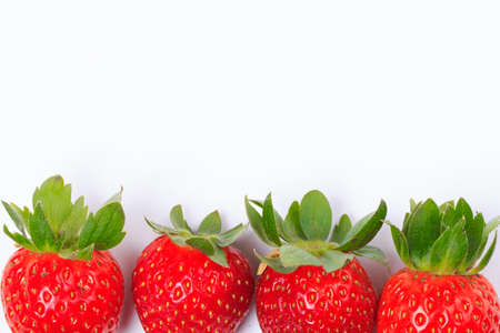Fresh red strawberries Placed on a white background.の写真素材