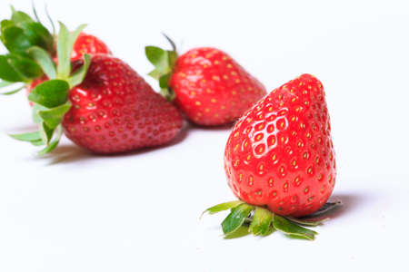 Fresh red strawberries Placed on a white background.の写真素材